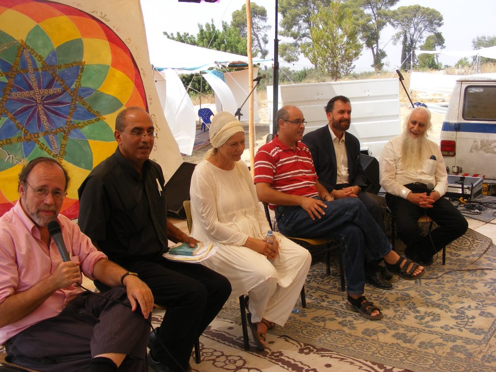 The inter-religious panel speaks on 'Sulha', conflict resolution in our religions From left Rabbi Marc Gopin, Rev. Samuel Fanous from Ramle, Sheikha Khadija, Ghassan Manasra, Rabbi David Rosen, Rabbi Menachem Froman