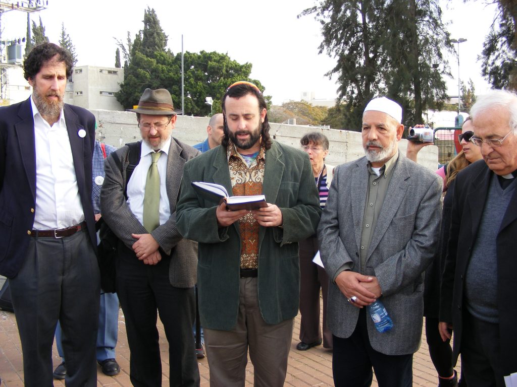 Eliyahu reading the Kaddish, a Jewish prayer for the dead