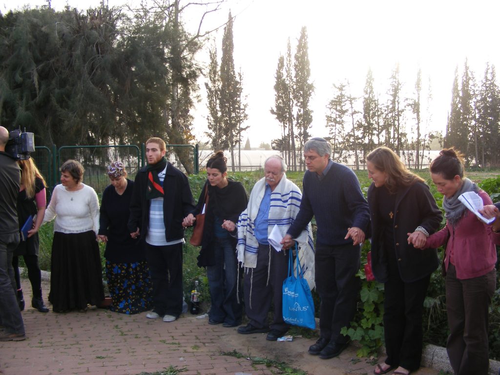 People of different faiths coming together in prayer